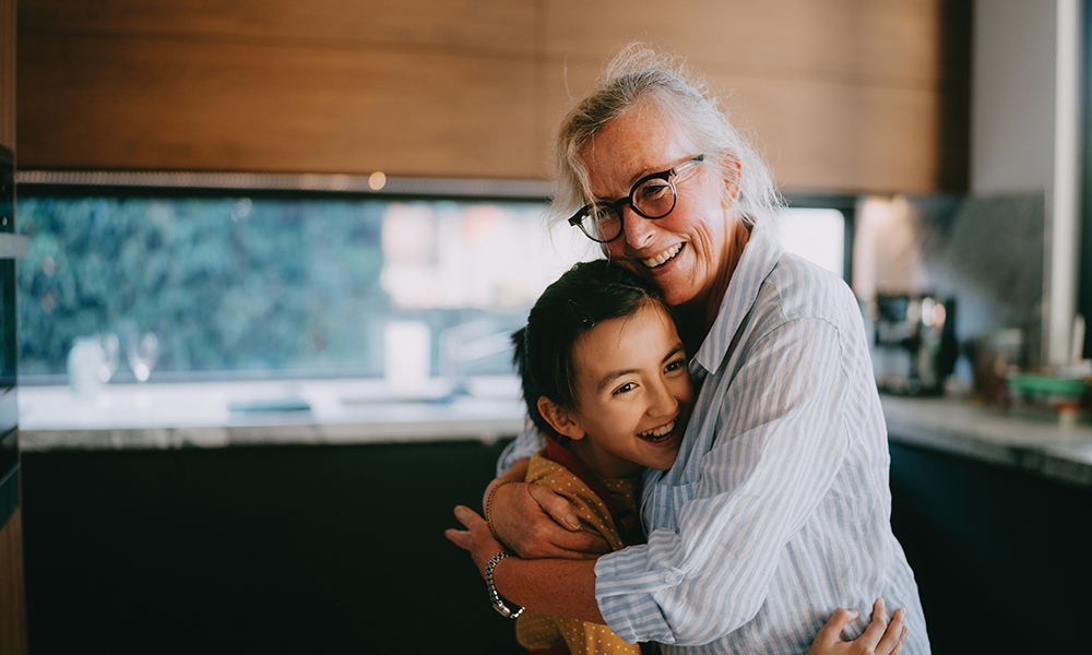 Grandmother hugging grandchild